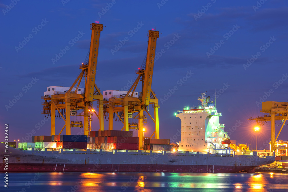 container ship in import export and business logistic.By crane , Trade Port , Shipping.Tugboat assis