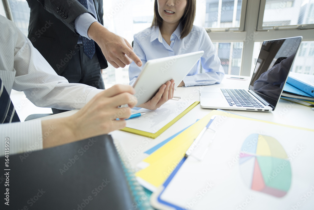 Businessmen report business to their boss