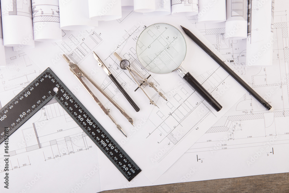 Workplace of architect - construction drawings and tools