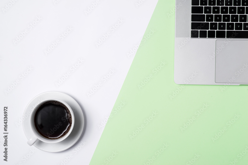 Business image. Pastel office desk table with laptop, and supplies. Top view with copy space