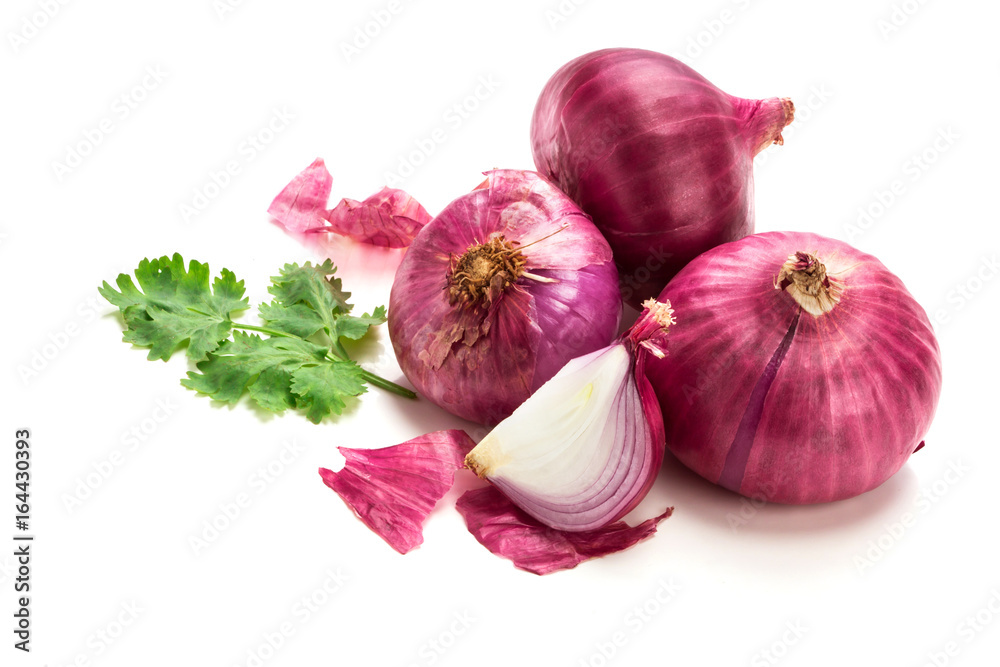 Fresh red onion sliced bulb and onion peel isolated on white background