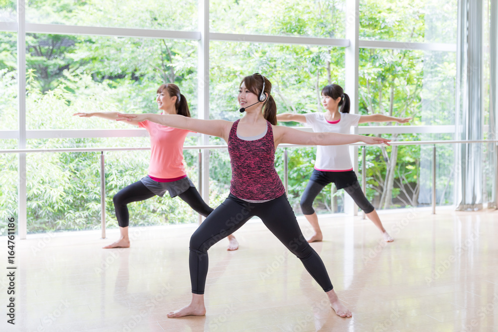 attractive asian women exercising in sports gym