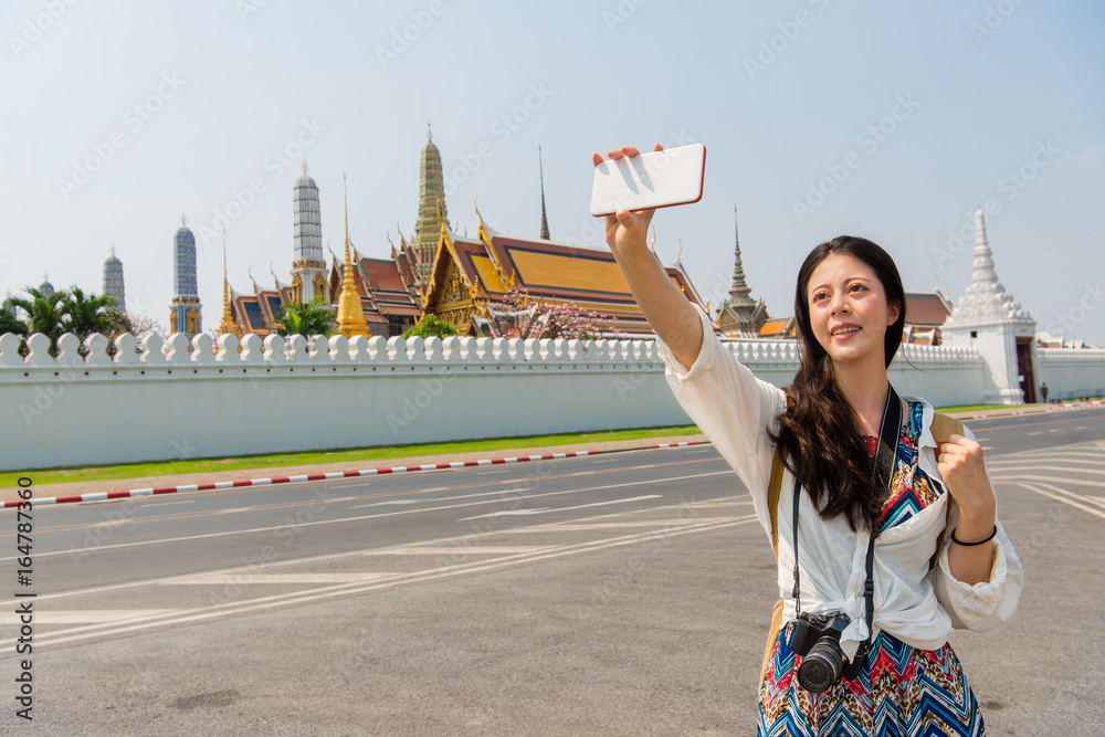 Travel selfie smart phone by woman in Bangkok