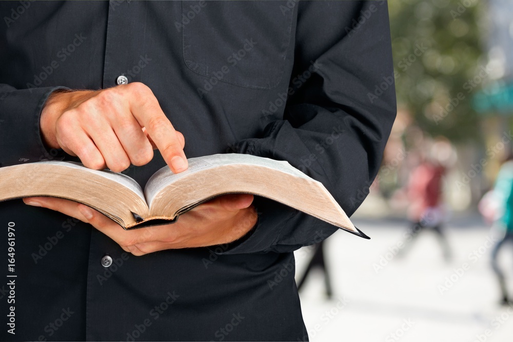 Man with book.