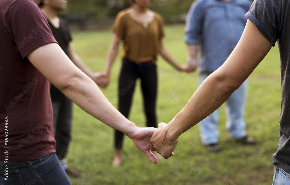 Group of people support unity arm around together