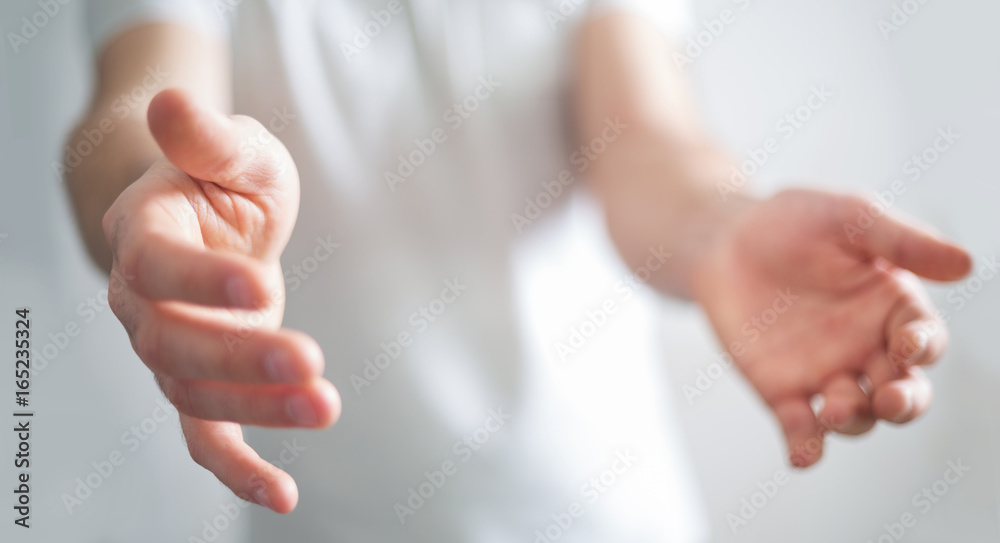 Businessman showing his empty hand