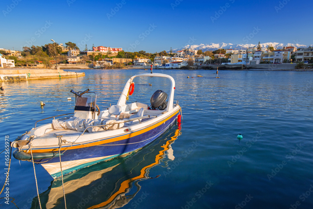 Fishing boats on the coastline of Kato Galatas town on Crete, Greece