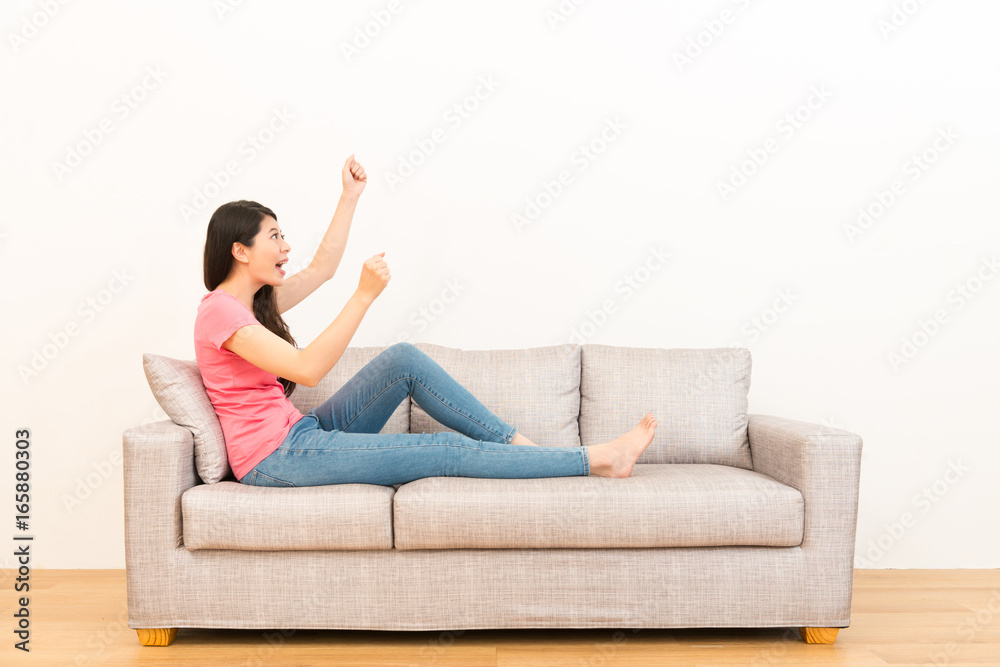 excited woman looking at the white background