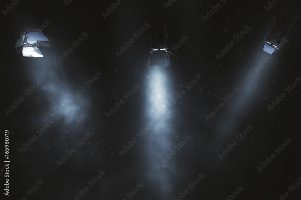 Three spotlight on smoky background