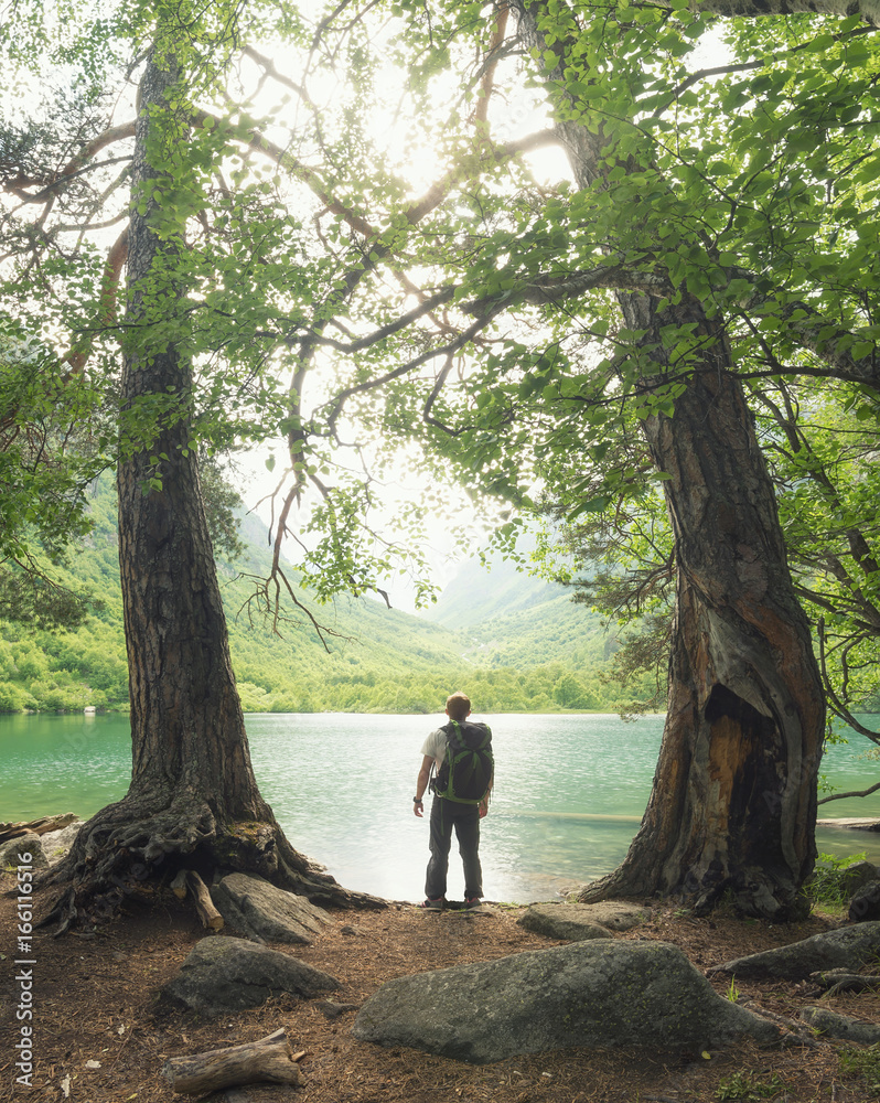 Tourist view on the lake. Concept and idea of travel and adventure