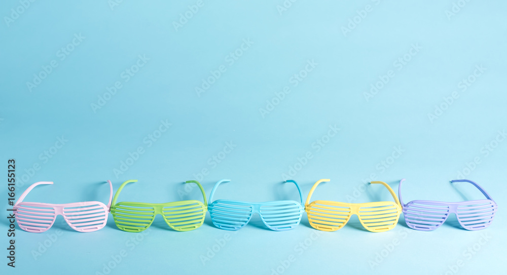 Shutter shades party glassess on a bright background