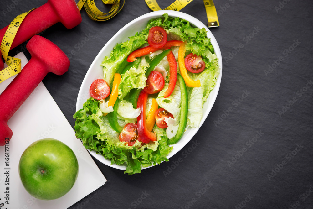 Healthy fitness meal with fresh salad. Diet concept.