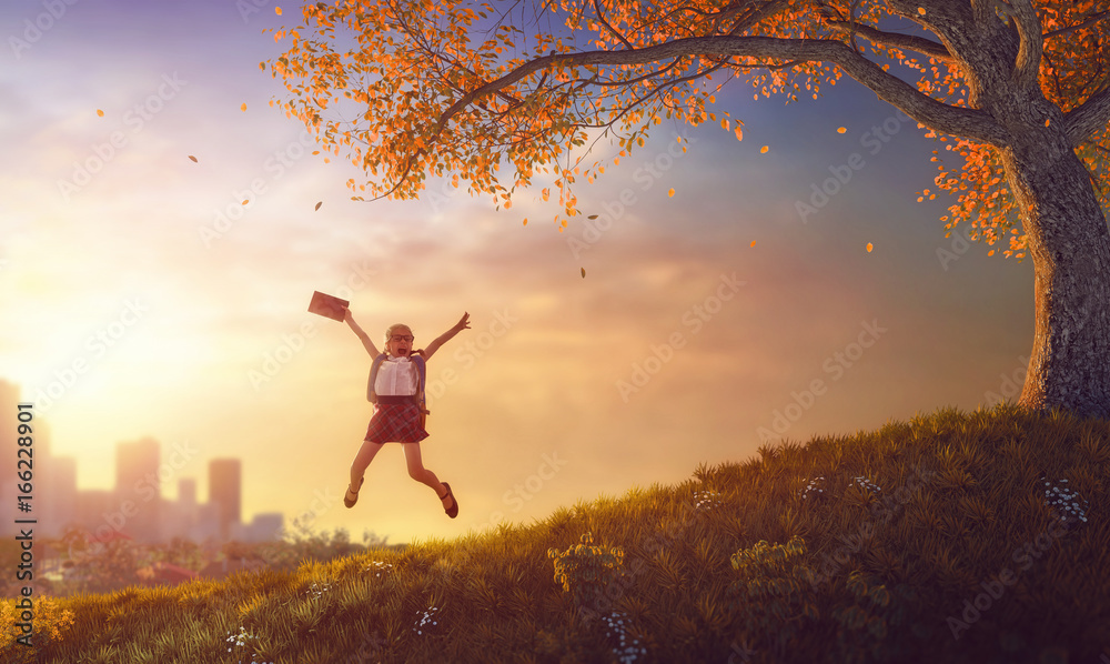 child jumping with book