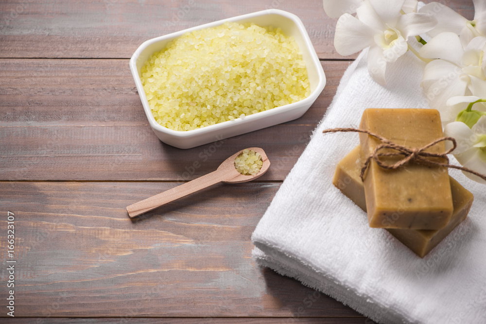 Spa set. Handmade, natural organic soap and white orchid on a wooden background