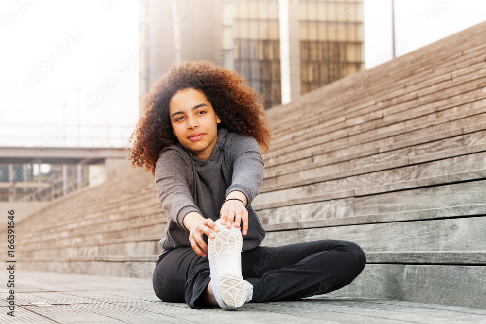 African young woman doing outdoor training workout