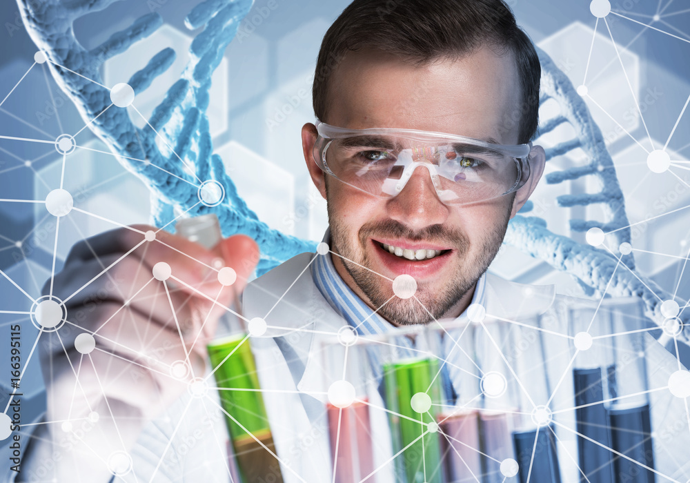 Portrait of concentrated male scientist working with reagents in laboratory