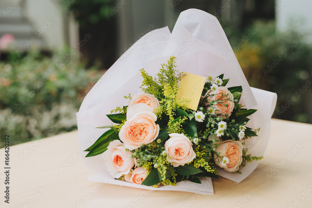 Beautiful fresh bouquet in box at floral shop, closeup