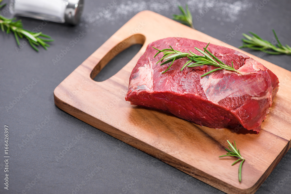 Raw beef cooking with ingredients. Top view with copy space