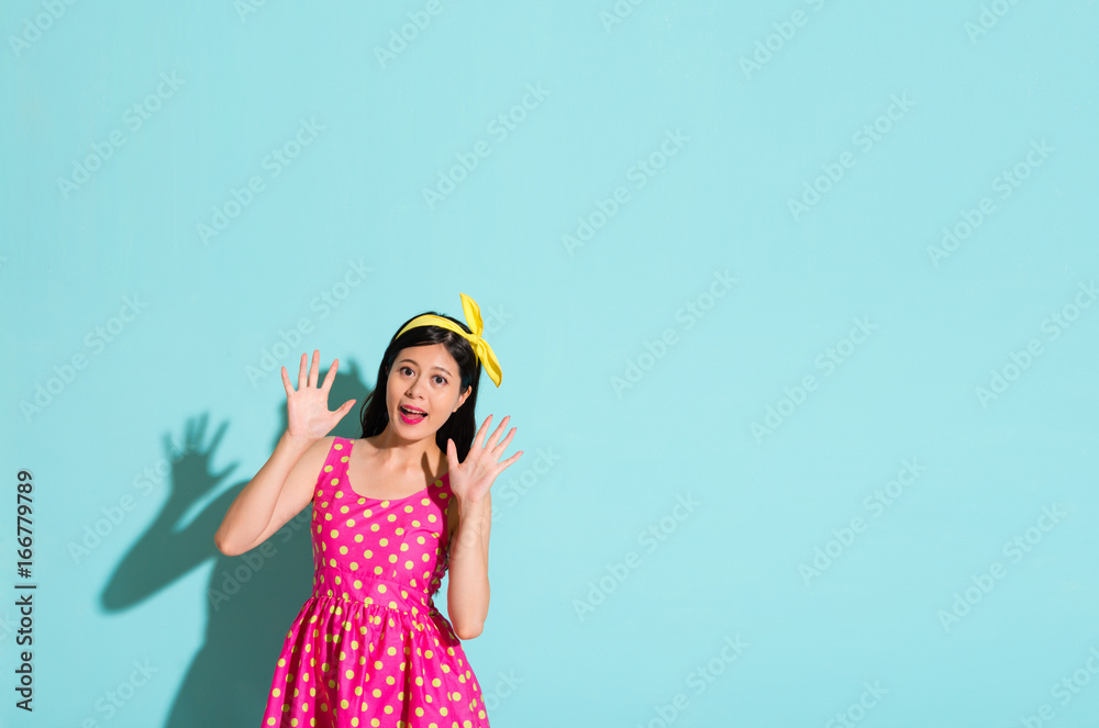 beautiful girl wearing a dotted pink cute dress