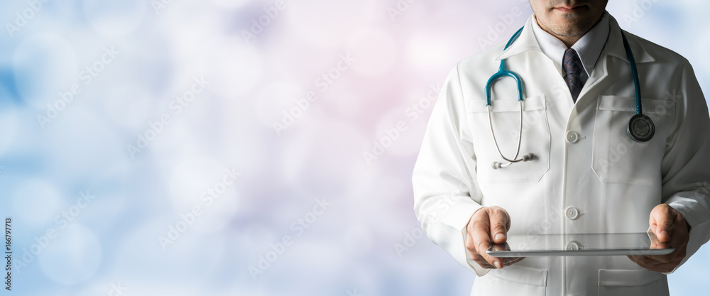 Male Doctor Holding Tablet Computer