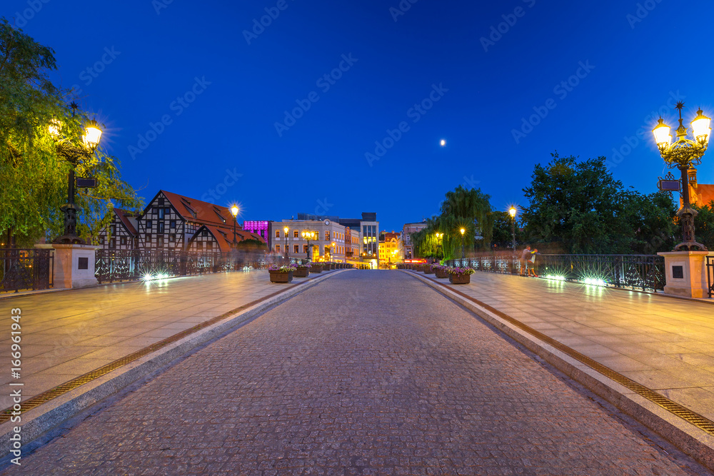 Bridge in Bydgoszcz city over Brda river at night, Poland