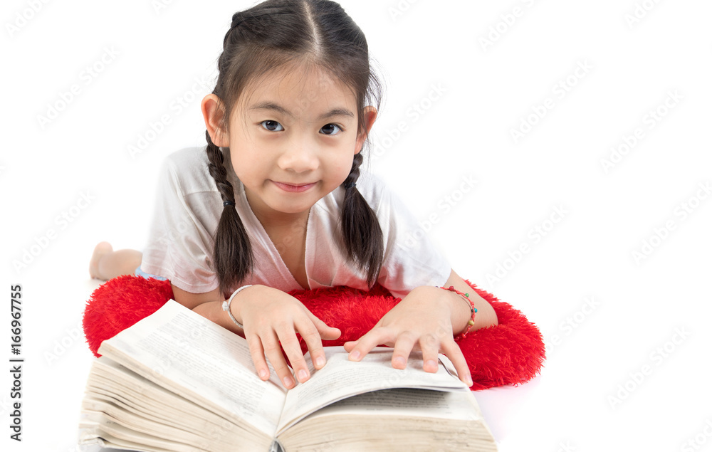 Headshot Portrait of happy cute girl reading a book .