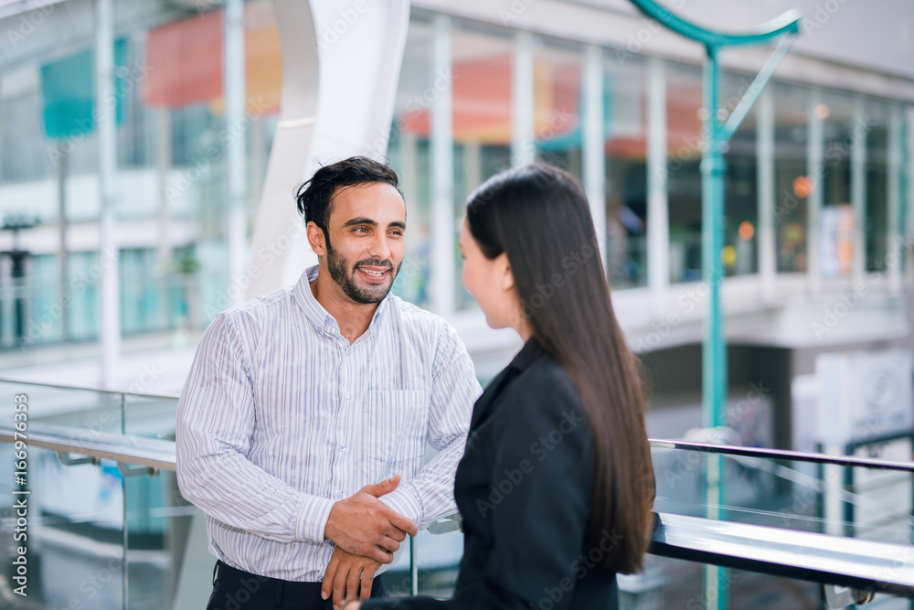 Business colleagues talking together outdoor