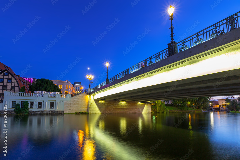 Bridge in Bydgoszcz city over Brda river at night, Poland