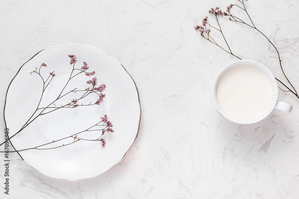 Dairy products. Top view of a cup of milk on a table.