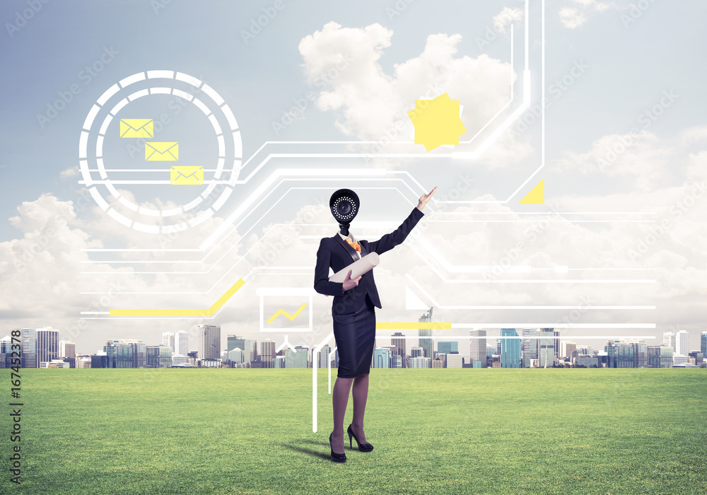 Camera headed woman standing on green grass against modern citys