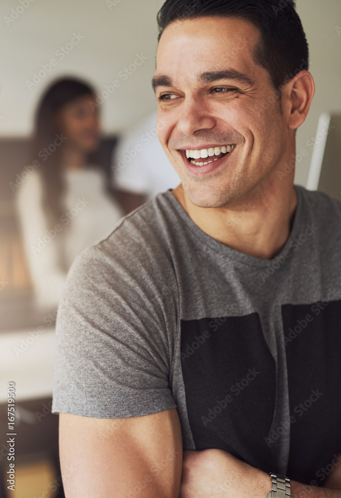 Portrait of man looking away in office