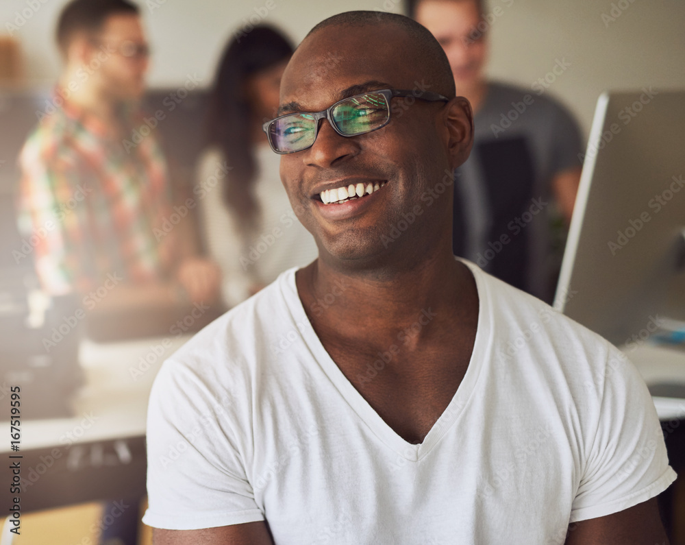 African American businessman smiling in the office