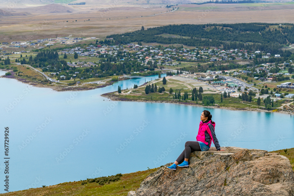 Woman Traveler at Lake Tekapo, New Zealand