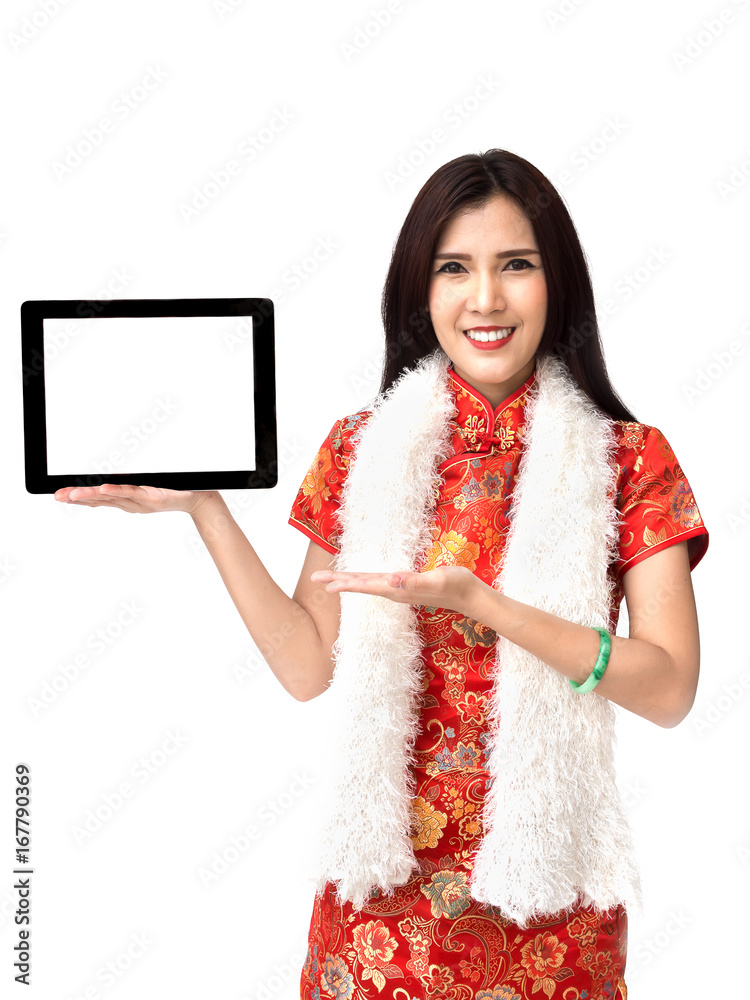 Chinese new year woman concept, isolated asian woman wearing red dress holding tablet with isolated 