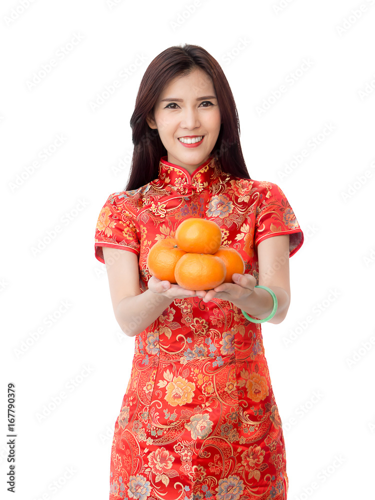 Chinese new year woman concept, isolated asian woman wearing red dress holding oranges