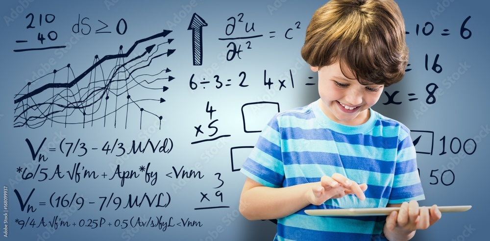 Composite image of smiling boy using digital tablet