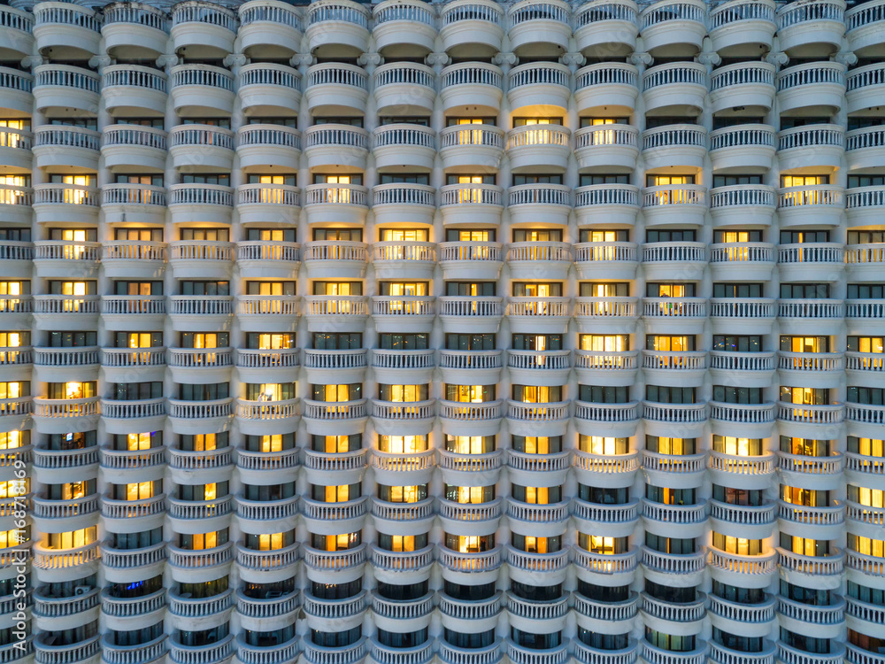 Background blurred .The rows of large white balconies of tall buildings. Window condo , Design of po