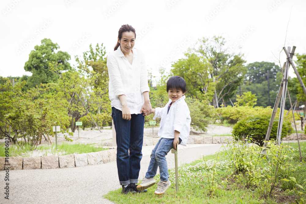 Mother and son joining hands