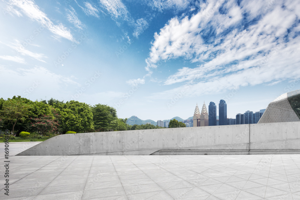 empty marble floor and cityscape of modern city