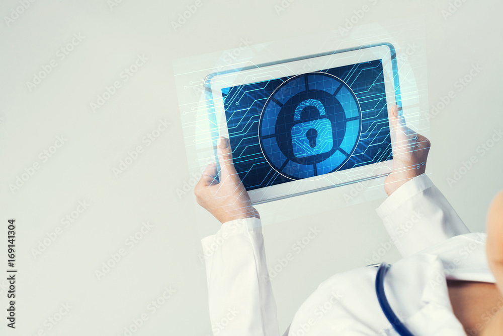 Close of female doctor hands working with tablet pc computer