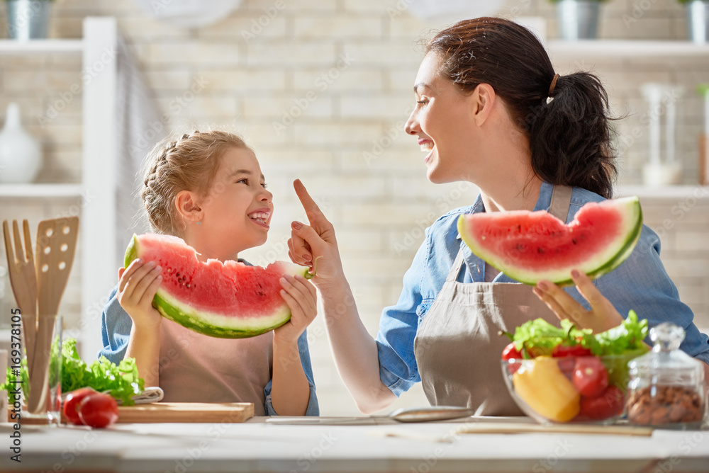 Happy family in the kitchen.