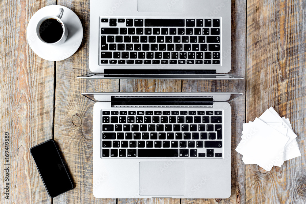 working place at home for two on wooden table