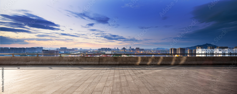 empty marble floor with cityscape of modern city