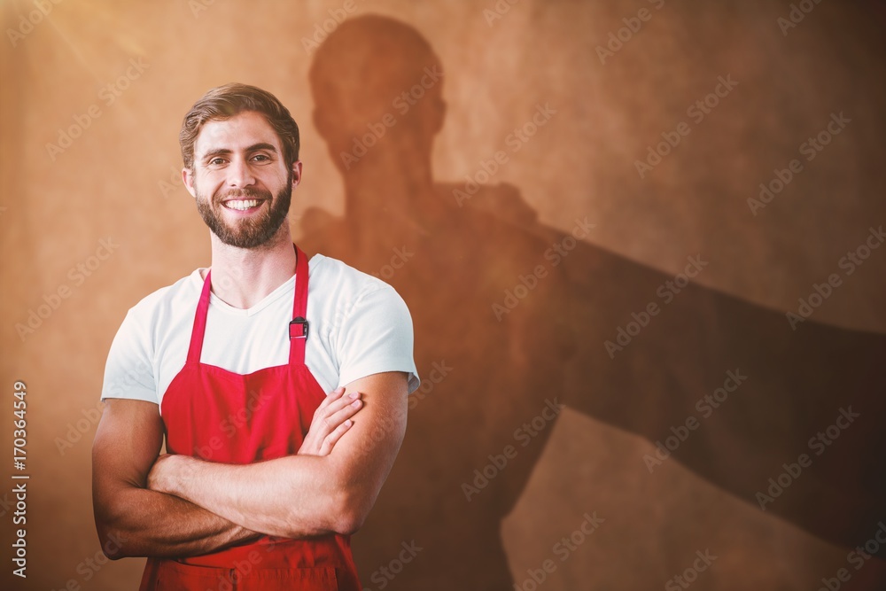 Composite image of portrait of smiling confident male owner with