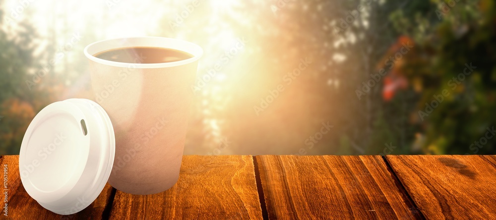 Composite image of coffee cup in front of its cover 