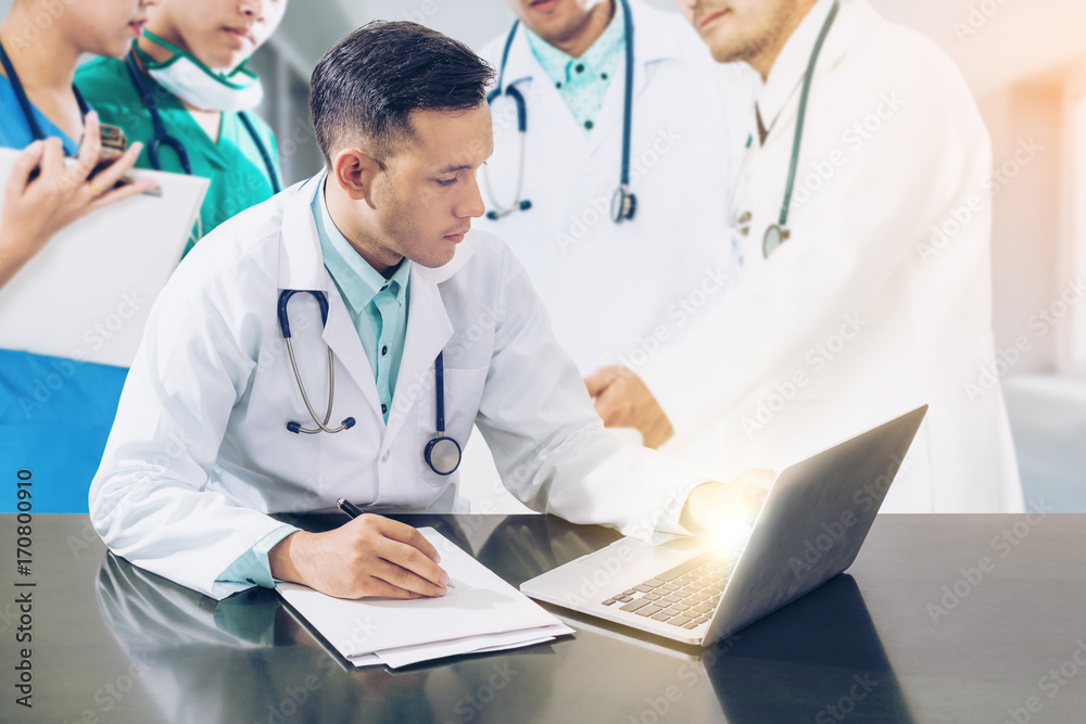 Doctor team meeting with laptop computer.