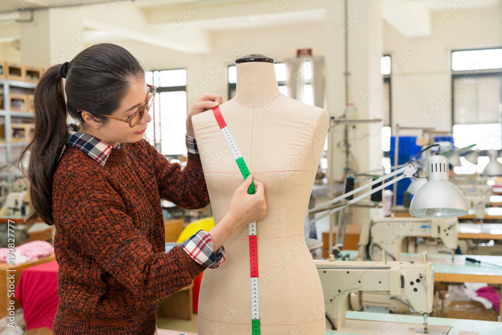 fashion clothing female designer using tape