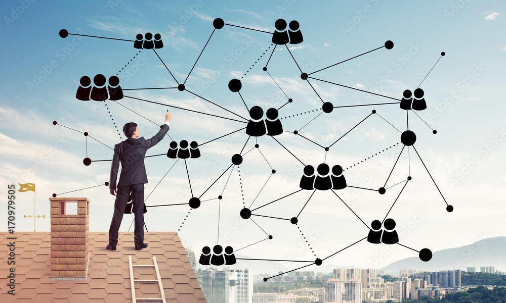 Businessman on house roof presenting networking and connection c