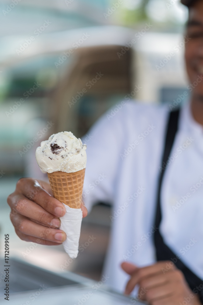 Cropped Image Of Waiter Serving Chocolate And Strawberry Ice cream