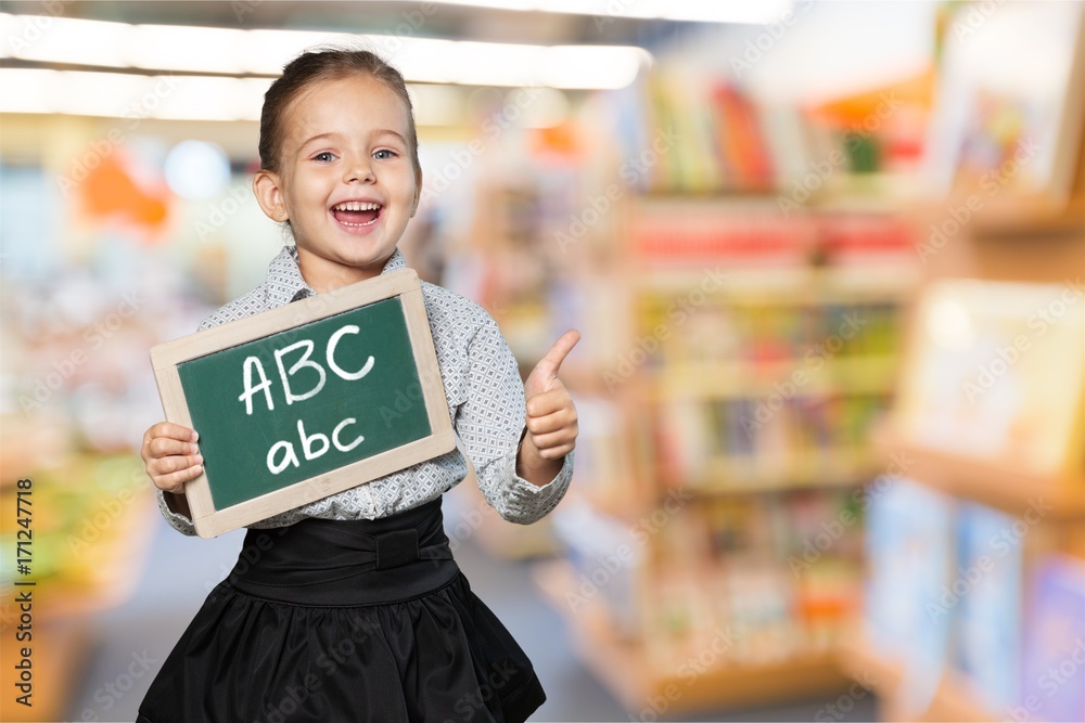 Child with blackboard.